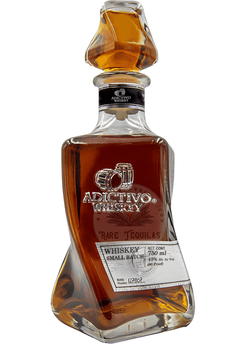 "Addictivo Whiskey bottle displayed at Sip N Burn Liquors, showcasing its premium quality and distinctive label."