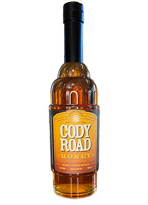 Cody Road Honey whiskey bottle from Sip N Burn Liquors with a rich amber color and a label featuring honeycomb design.