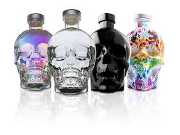 Crystal Head Vodka bottle displayed with a sleek glass design, perfect for cocktails, available at Sip N Burn Liquors.